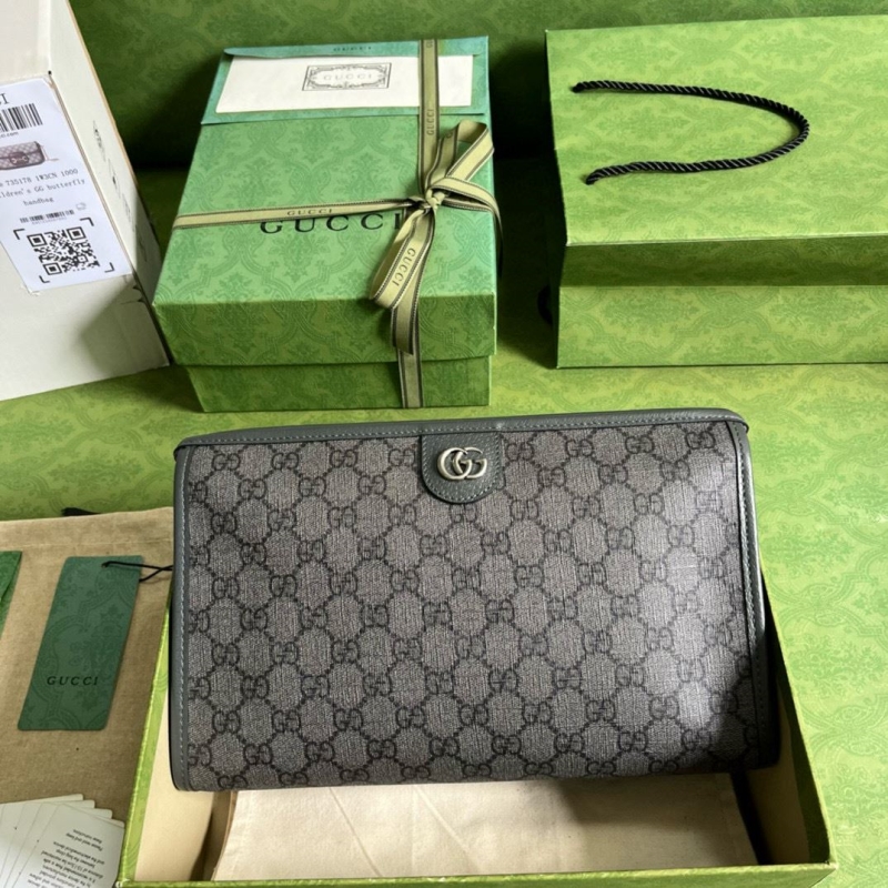 G*u*i clutch bags